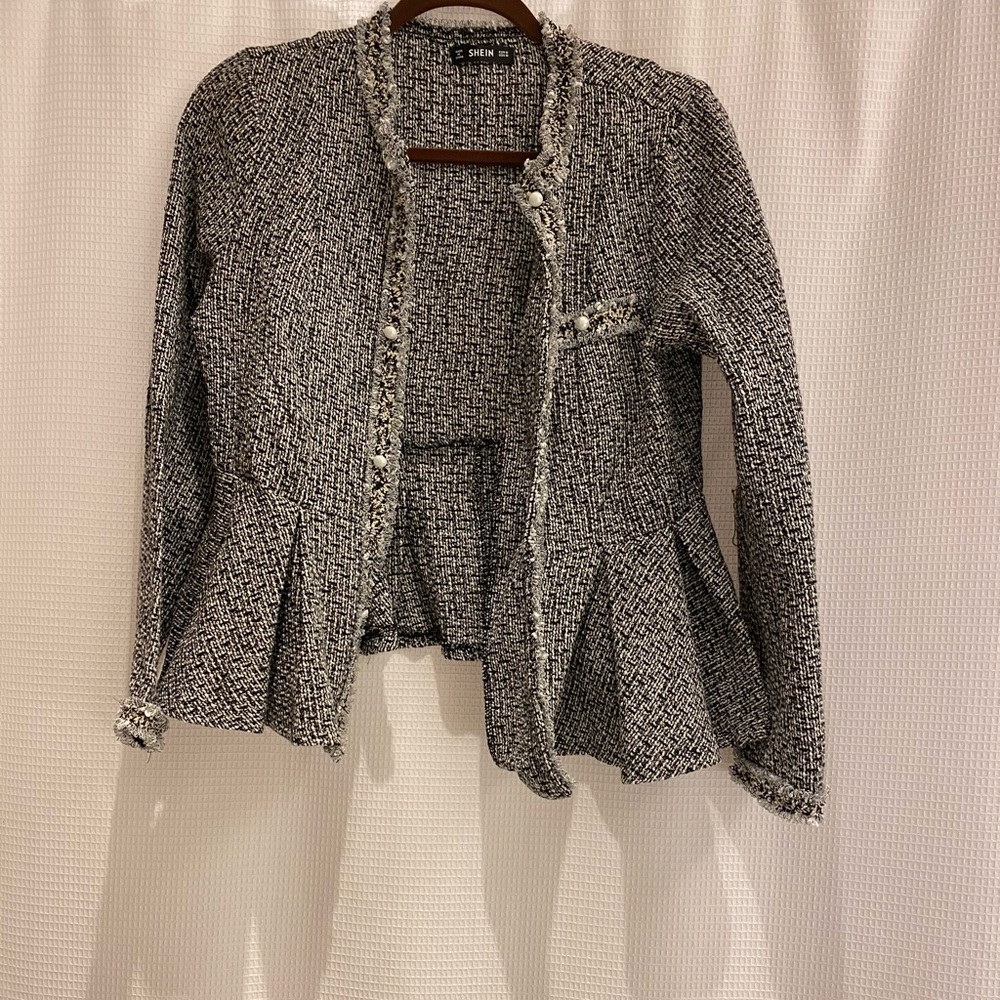 Looks like tweed jacket